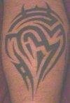 Tribal on back of right calf