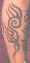 Tribal on outside right calf w/ added red