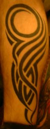 Tribal on inside right calf