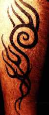 Tribal on outside right calf